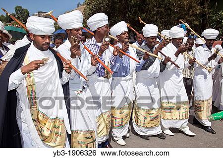 A Street Procession of Priests and Deacons During Timkat The Festival of Epiphany, Gondar, Ethiopia View Large Photo Image Stock Photograph - A Street Procession of Priests and Deacons During Timkat The Festival of Epiphany, Gondar, Ethiopia. Fotosearch