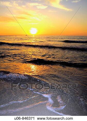 A sunset and surf at beach in southwest, Florida, USA View Large Photo Image Stock Image - A sunset and surf at beach in southwest, Florida, USA. Fotosearch