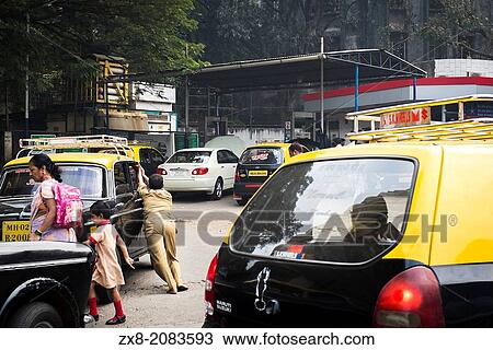 A taxi driver pushes his broken down taxi to a service station, while a woman walks a child back from school. View Large Photo Image Stock Image - A taxi driver pushes his broken down taxi to a service station, while a woman walks a child back from school.. Fotosearch