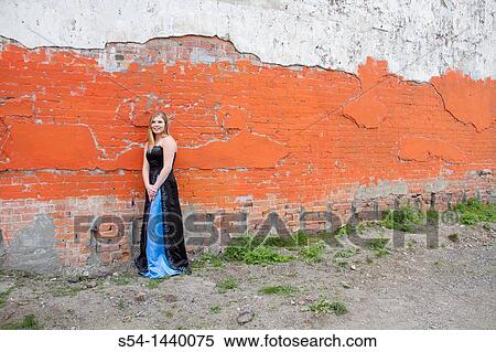 A teen girl dressed up, standing by a building in downtown Spokane, Washington, USA. View Large Photo Image Stock Photography - A teen girl dressed up, standing by a building in downtown Spokane, Washington, USA.. Fotosearch