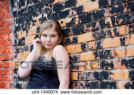 A teen girl outdoors View Large Photo Image Picture - A teen girl outdoors. Fotosearch