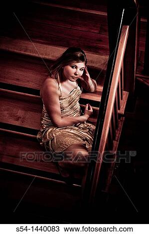 A teen girl sitting on a stairway. View Large Photo Image Stock Image - A teen girl sitting on a stairway.. Fotosearch