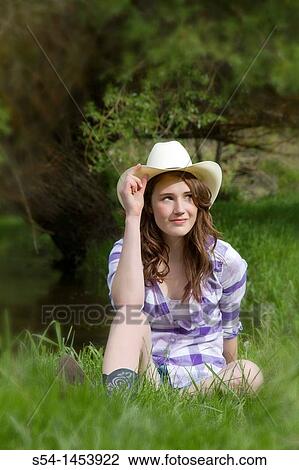 A teenaged girl outdoors View Large Photo Image Stock Image - A teenaged girl outdoors. Fotosearch