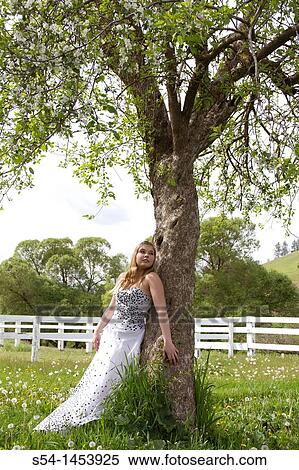 Stock Photography - A teenaged girl outdoors. Fotosearch