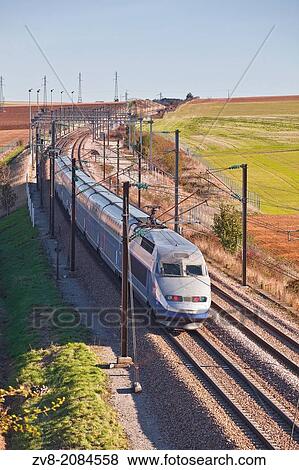 A TGV speeds through the Burgundy countryside of France. View Large Photo Image Stock Photo - A TGV speeds through the Burgundy countryside of France.. Fotosearch