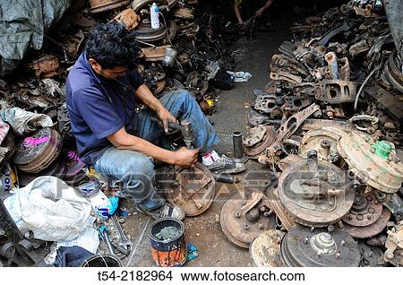 A Thai people at work in a scrapyard in Bangkok View Large Photo Image Picture - A Thai people at work in a scrapyard in Bangkok. Fotosearch