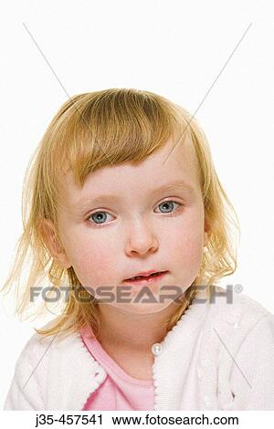 A three year old girl with blonde hair wearing a white sweater appears to be in thought. View Large Photo Image Stock Image - A three year old girl with blonde hair wearing a white sweater appears to be in thought.. Fotosearch