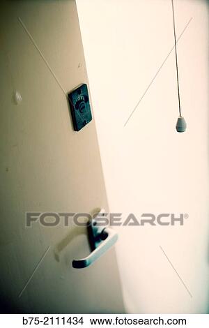 A toilet door open with the light on View Large Photo Image Picture - A toilet door open with the light on. Fotosearch