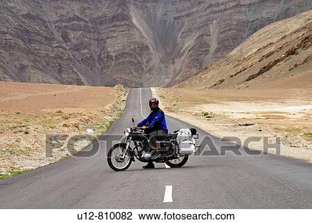 A Tourist is driving Enfield in Himalayas. View Large Photo Image Stock Image - A Tourist is driving Enfield in Himalayas.. Fotosearch