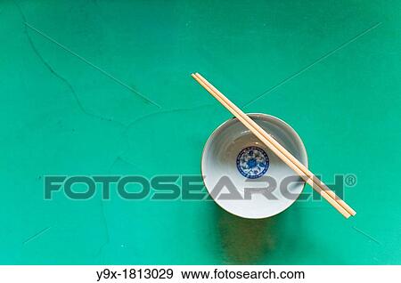 A traditional bowl and chopsticks at the San Huang Zhai Monastery on the Song Mountain, China View Large Photo Image Stock Photo - A traditional bowl and chopsticks at the San Huang Zhai Monastery on the Song Mountain, China. Fotosearch
