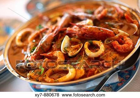 A traditional Cataplana meal at Os Salgados restaurant on Praia Dos Salgados Salgados Beach in the Algarve, Portugal PROPERTY RELEASE AVAILABLE View Large Photo Image Stock Photo - A traditional Cataplana meal at Os Salgados restaurant on Praia Dos Salgados Salgados Beach in the Algarve, Portugal PROPERTY RELEASE AVAILABLE. Fotosearch