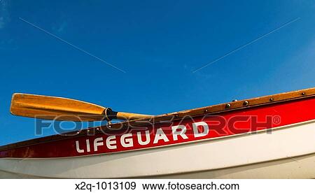 A traditional red and white lifeboat View Large Photo Image Stock Photo - A traditional red and white lifeboat. Fotosearch