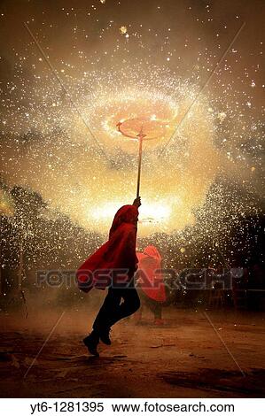 A traditional's festival in Catalonia Devils throw fireworks with his hayforks Molins de Rei, Barcelona, Catalonia, Europe, 2010 View Large Photo Image Stock Photography - A traditional's festival in Catalonia Devils throw fireworks with his hayforks Molins de Rei, Barcelona, Catalonia, Europe, 2010. Fotosearch