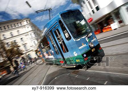 A tram in motion in the city of Graz in Austria View Large Photo Image Stock Photo - A tram in motion in the city of Graz in Austria. Fotosearch