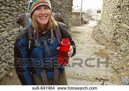 A trekker starting out on a cold morning Manang, Nepal View Large Photo Image Picture - A trekker starting out on a cold morning Manang, Nepal. Fotosearch