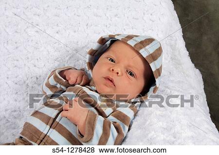 A two week old baby boy sitting View Large Photo Image Stock Photo - A two week old baby boy sitting. Fotosearch