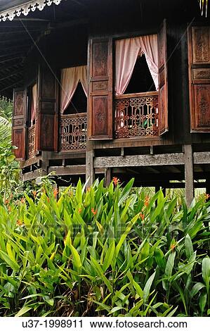 A typical Malay wooden house at Sarawak Cultural Village. View Large Photo Image Stock Image - A typical Malay wooden house at Sarawak Cultural Village.. Fotosearch