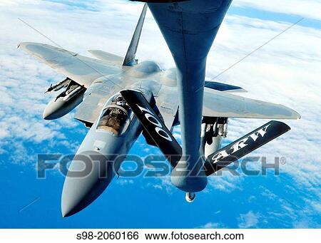 A U. S. Air Force F-15C Eagle finishes refueling with a U. S. Air Force KC-135R Stratotanker Sept. 12, 2013, en route to the Arctic Challenge exercise. View Large Photo Image Stock Photograph - A U. S. Air Force F-15C Eagle finishes refueling with a U. S. Air Force KC-135R Stratotanker Sept. 12, 2013, en route to the Arctic Challenge exercise.. Fotosearch