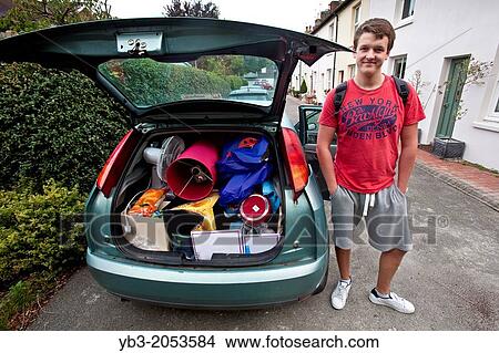 A University Student Preparing To Leave Home For The First Time To Go To University, Sussex, England. View Large Photo Image Picture - A University Student Preparing To Leave Home For The First Time To Go To University, Sussex, England.. Fotosearch