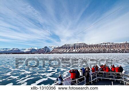 Stock Photograph - A view of Isfjorden Ice fjord on the western side of Spitsbergen Island in the Svalbard Archipelago, Norway. Fotosearch