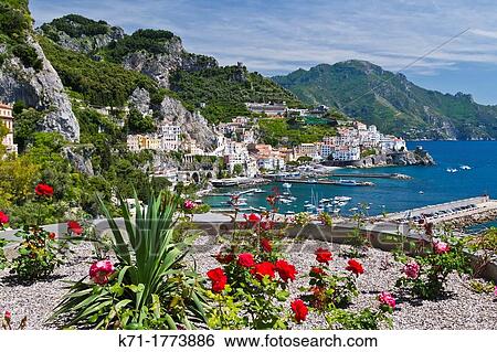 Stock Photograph - A view of the coastal town of Amalfi on the Gulf of Salerno in southern Italy. Fotosearch