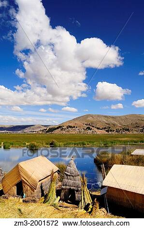 A village in the floating islands of the Uros in Peru. View Large Photo Image Stock Image - A village in the floating islands of the Uros in Peru.. Fotosearch