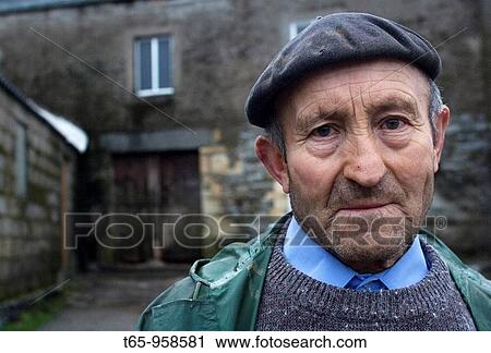 A villager in front of his house. Alto do Hospital, O Cebreiro, Way of St. James, French Way View Large Photo Image Stock Image - A villager in front of his house. Alto do Hospital, O Cebreiro, Way of St. James, French Way. Fotosearch