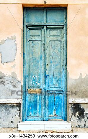 A weathered door in the Spanish Mediterranean town of Torrevieja, Spain, Alicante View Large Photo Image Stock Photo - A weathered door in the Spanish Mediterranean town of Torrevieja, Spain, Alicante. Fotosearch