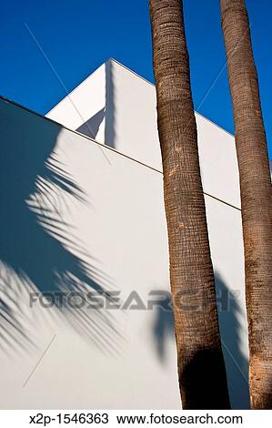 A white wall in a modern building View Large Photo Image Stock Image - A white wall in a modern building. Fotosearch