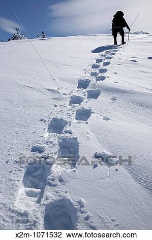 A winter hiker ascends the Air Line Trail in extreme weather conditions during the winter months in the White Mountains, New Hampshire USA View Large Photo Image Stock Image - A winter hiker ascends the Air Line Trail in extreme weather conditions during the winter months in the White Mountains, New Hampshire USA. Fotosearch
