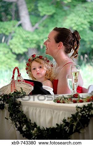A woman and girl at a wedding View Large Photo Image Stock Image - A woman and girl at a wedding. Fotosearch