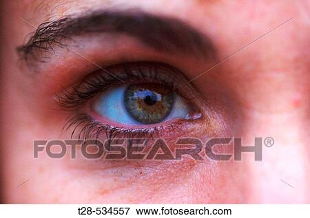Stock Photo - A woman eye crying. Fotosearch
