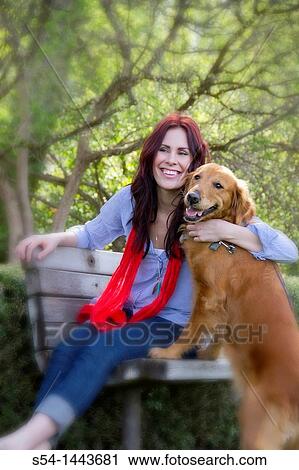 A woman outdoors with her Golden Retriever View Large Photo Image Stock Image - A woman outdoors with her Golden Retriever. Fotosearch