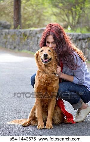 A woman outdoors with her Golden Retriever View Large Photo Image Stock Photography - A woman outdoors with her Golden Retriever. Fotosearch