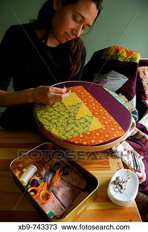 A woman sewing patchwork View Large Photo Image Stock Image - A woman sewing patchwork. Fotosearch