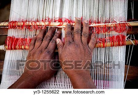 A woman weaves a shawl outside her home in San Andr's Tzicuilan, on the outskirts of Cuetzalan del Progreso, Mexico. View Large Photo Image Stock Image - A woman weaves a shawl outside her home in San Andr's Tzicuilan, on the outskirts of Cuetzalan del Progreso, Mexico.. Fotosearch