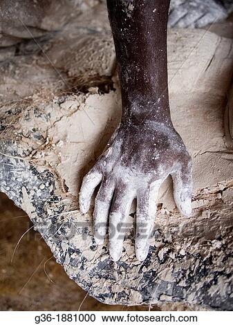 A worker's hand covered with plaster in Ahmedabad, India View Large Photo Image Stock Image - A worker's hand covered with plaster in Ahmedabad, India. Fotosearch