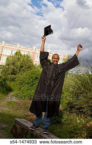 A young, african-american male graduate View Large Photo Image Stock Image - A young, african-american male graduate. Fotosearch
