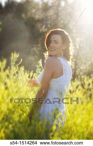 A young caucasian woman outdoors in Spokane, Washington, USA. View Large Photo Image Picture - A young caucasian woman outdoors in Spokane, Washington, USA.. Fotosearch
