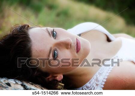 Stock Photograph - A young caucasian woman outdoors in Spokane, Washington, USA.. Fotosearch
