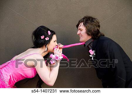 Stock Image - A young couple dressed up for their high school prom in Spokane, Washington, USA.. Fotosearch
