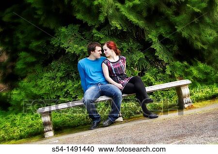 Stock Image - A young couple outdoors. Fotosearch