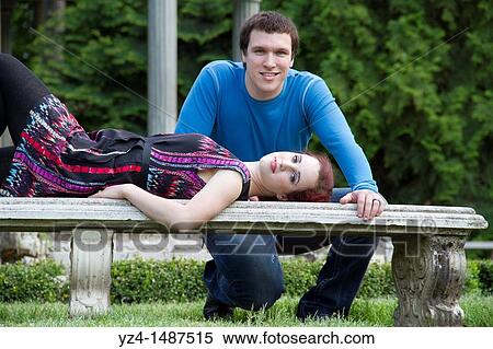 Stock Photography - A young couple together at a park in Washington State, USA.. Fotosearch