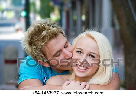 A young couple together outdoors in Spokane, Washington, USA. View Large Photo Image Stock Photo - A young couple together outdoors in Spokane, Washington, USA.. Fotosearch