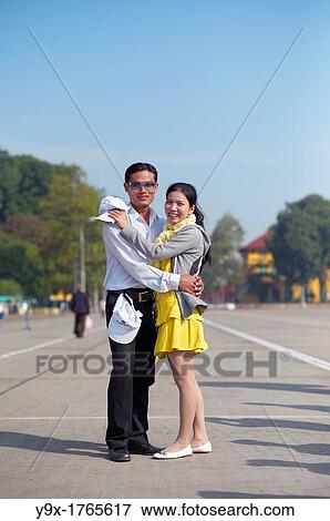 A young fashionable Vietnamese couple View Large Photo Image Stock Photo - A young fashionable Vietnamese couple. Fotosearch