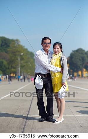 A young fashionable Vietnamese couple View Large Photo Image Stock Photography - A young fashionable Vietnamese couple. Fotosearch