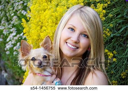 Stock Photography - A young lady with a chihuahua. Fotosearch