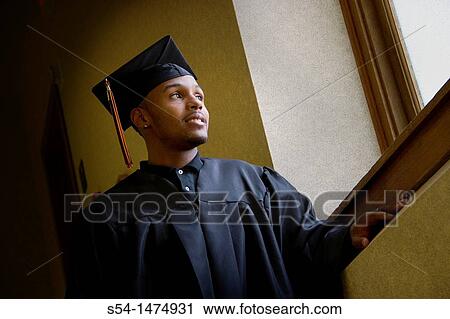 A young male graduate View Large Photo Image Stock Image - A young male graduate. Fotosearch