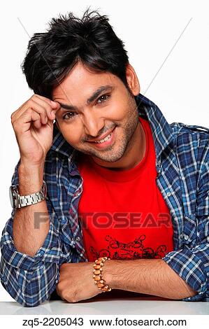 A young man in playful mood, Pune, India. View Large Photo Image Stock Image - A young man in playful mood, Pune, India.. Fotosearch