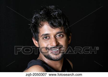 A young man smiling. Pune India View Large Photo Image Stock Photo - A young man smiling. Pune India. Fotosearch